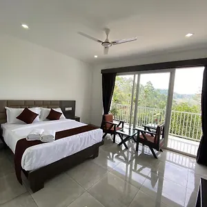 https://resort-rainwood-aurum.hotels-munnar.com